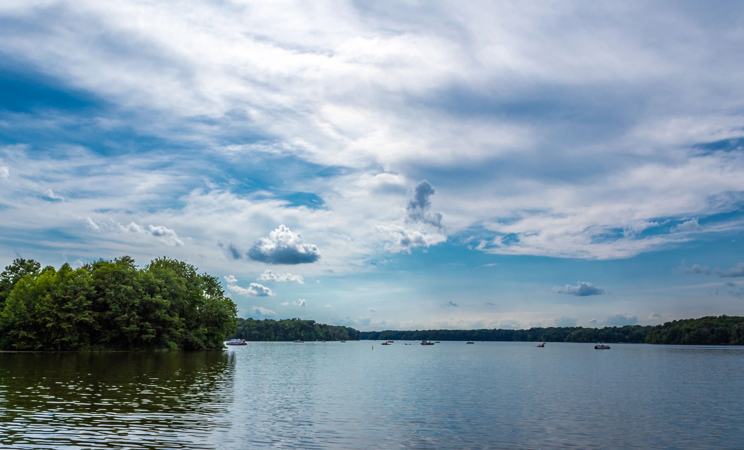 Scenic Ohio lake and park landscape under a cloudy sky