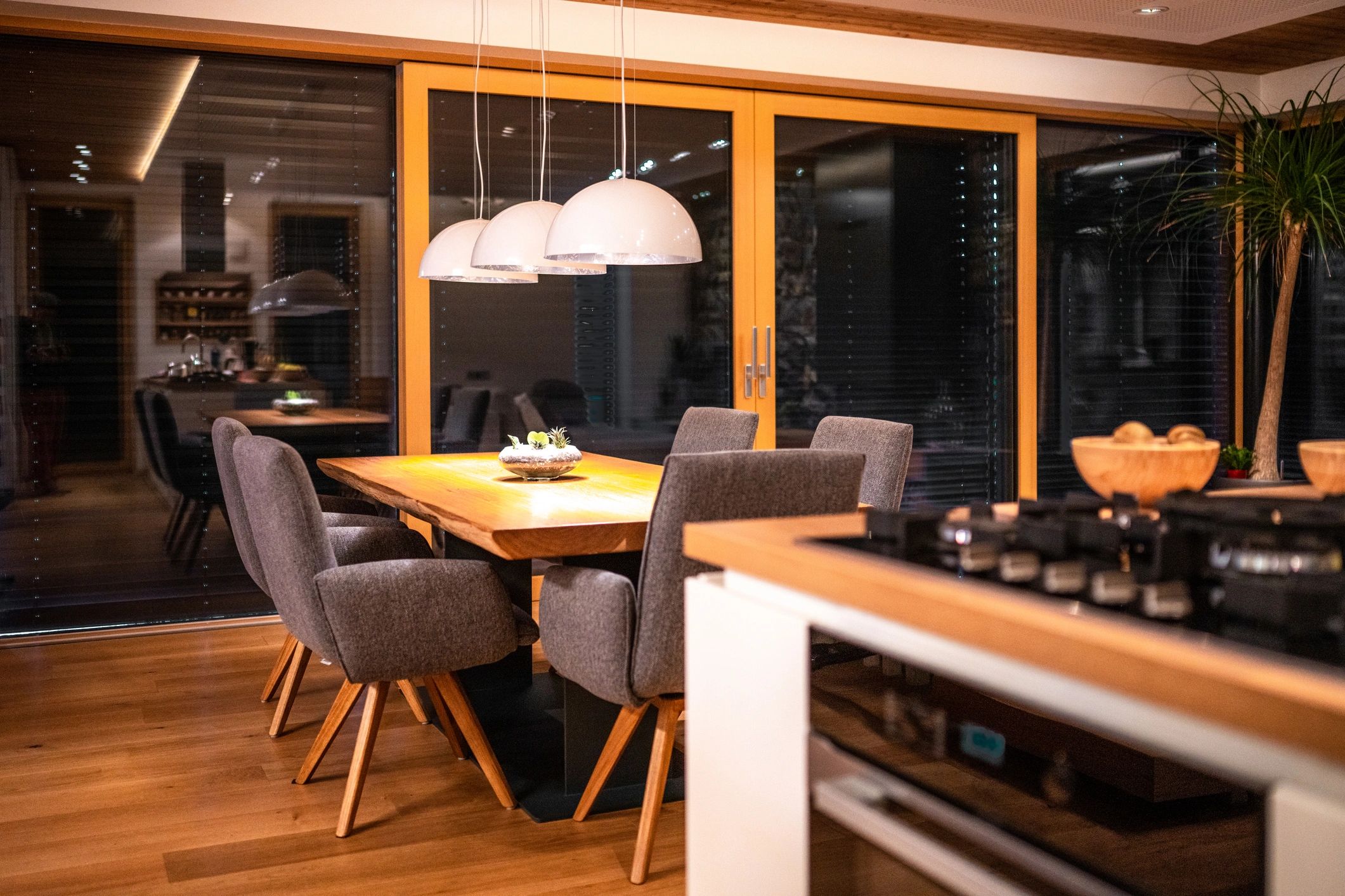 Modern kitchen with dining table